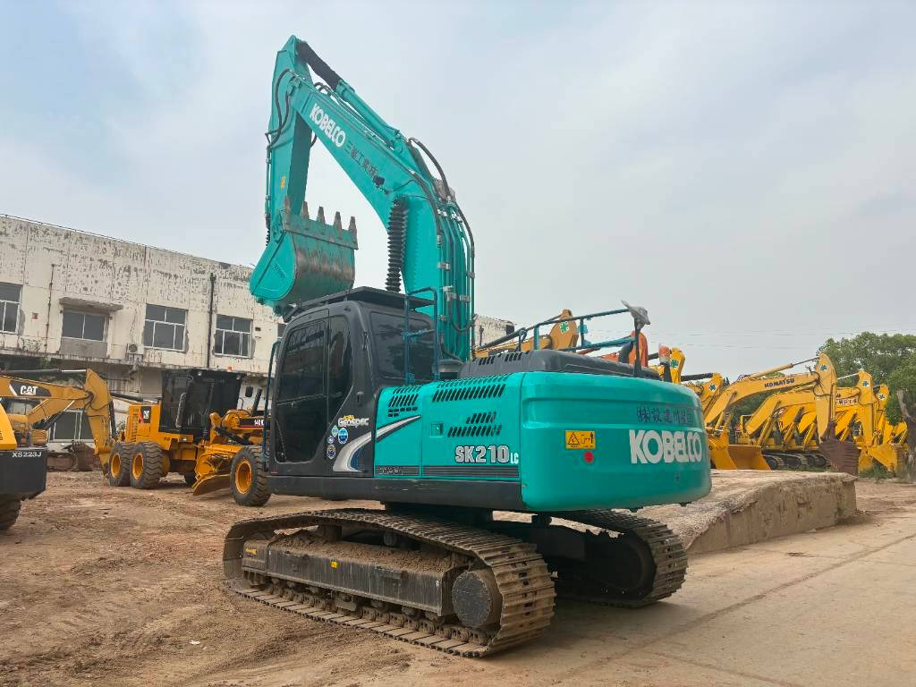 Kāpurķēžu ekskavators Kobelco SK 210: foto 16