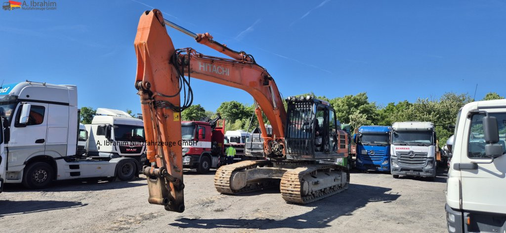 Hitachi ZX 300LCN-6 Schaden imHeckbereich, läuft aber !! 8125 h - Kāpurķēžu ekskavators: foto 1 Hitachi ZX 300LCN-6 Schaden imHeckbereich, läuft aber !! 8125 h - Kāpurķēžu ekskavators: foto 1
