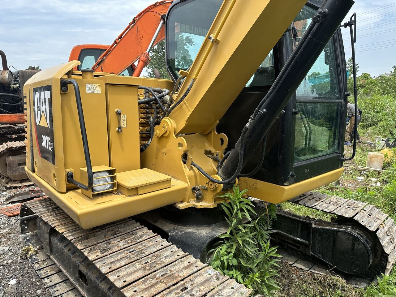 Caterpillar 307E - Kāpurķēžu ekskavators: foto 1 Caterpillar 307E - Kāpurķēžu ekskavators: foto 1