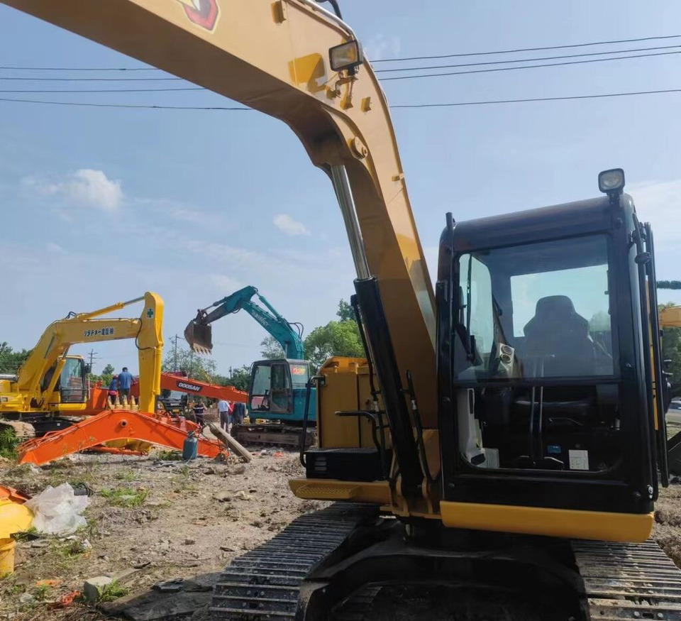 Caterpillar 307E - Kāpurķēžu ekskavators: foto 5 Caterpillar 307E - Kāpurķēžu ekskavators: foto 5