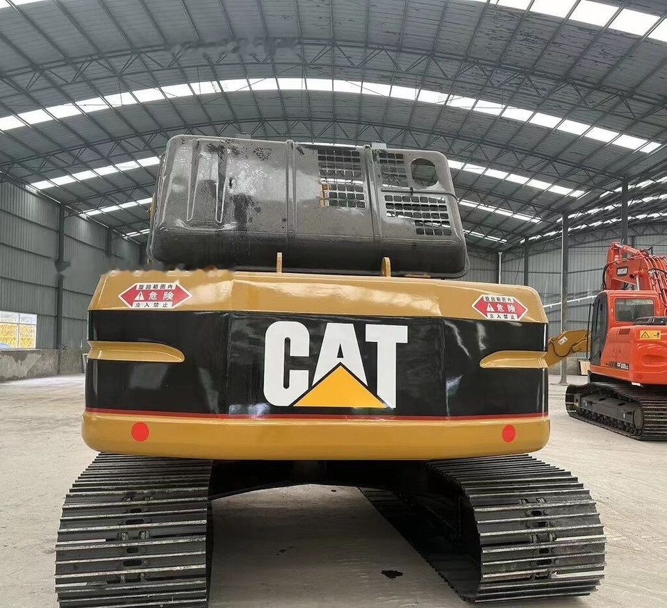 Caterpillar 320BL - Kāpurķēžu ekskavators: foto 1 Caterpillar 320BL - Kāpurķēžu ekskavators: foto 1