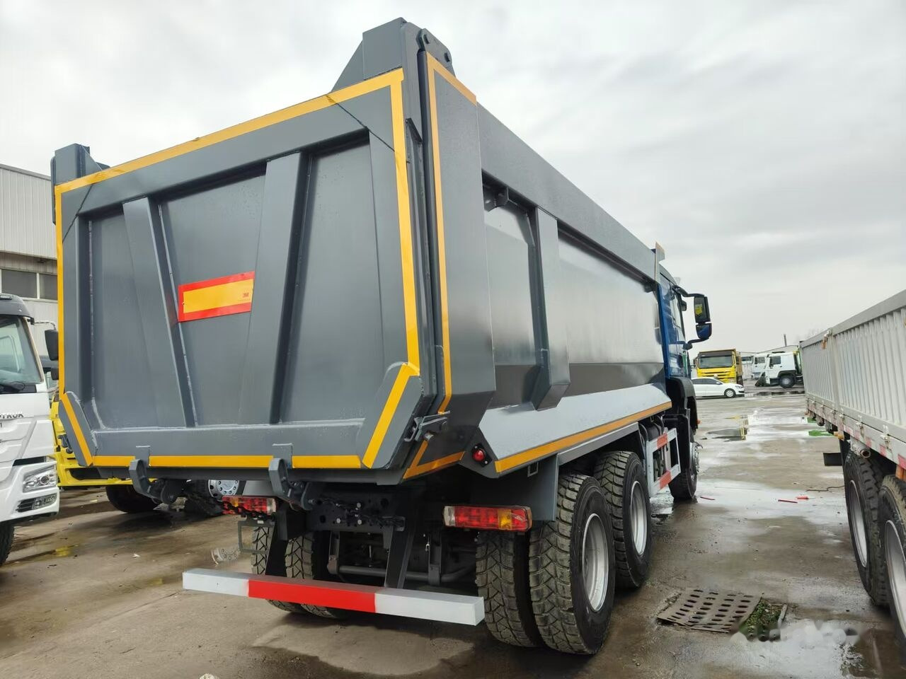 Howo TX 450 - Kravas automašīna pašizgāzējs: foto 1 Howo TX 450 - Kravas automašīna pašizgāzējs: foto 1