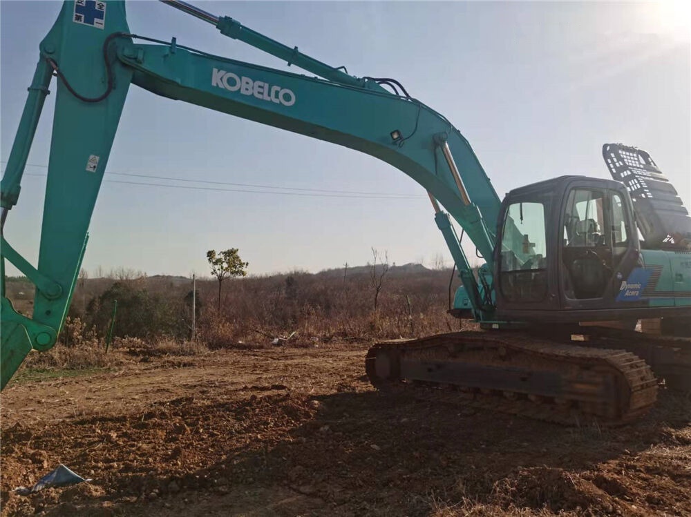 Kāpurķēžu ekskavators Kobelco SK210: foto 8