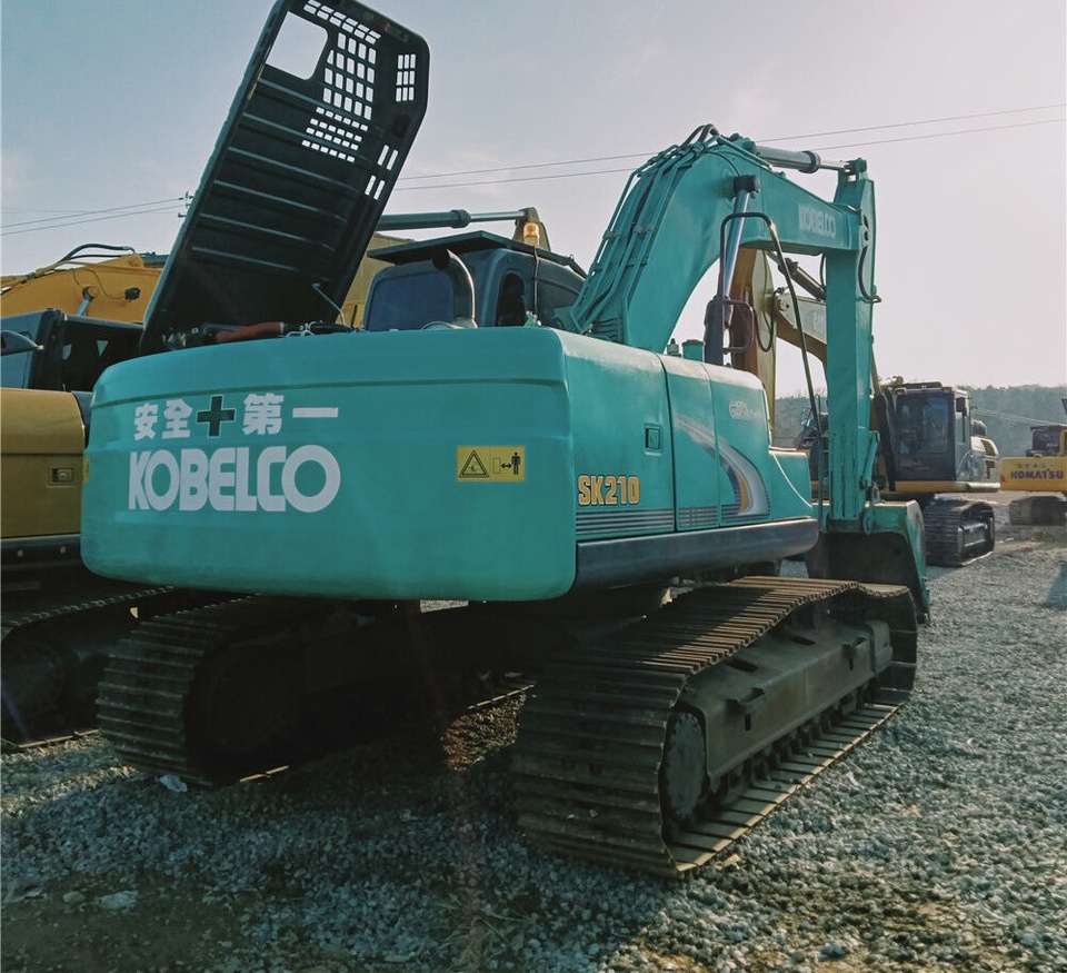 Kobelco SK210 - Kāpurķēžu ekskavators: foto 3 Kobelco SK210 - Kāpurķēžu ekskavators: foto 3