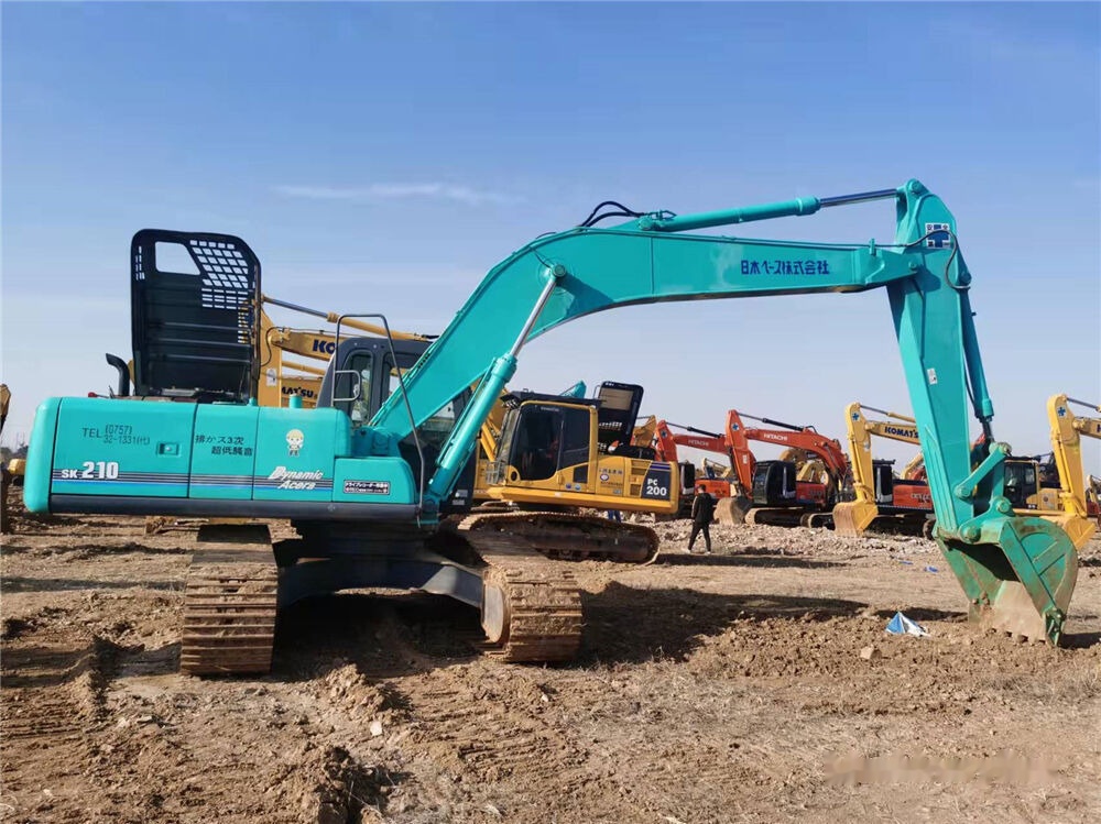 Kāpurķēžu ekskavators Kobelco SK210: foto 7