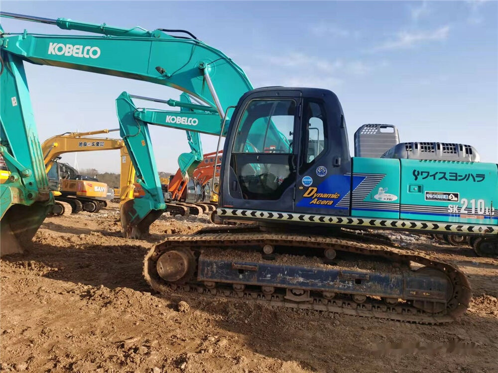 Kobelco SK210LC - Kāpurķēžu ekskavators: foto 5 Kobelco SK210LC - Kāpurķēžu ekskavators: foto 5