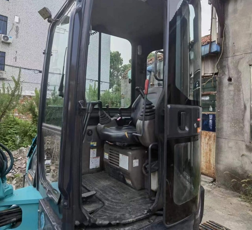 Kobelco SK55 - Kāpurķēžu ekskavators: foto 1 Kobelco SK55 - Kāpurķēžu ekskavators: foto 1