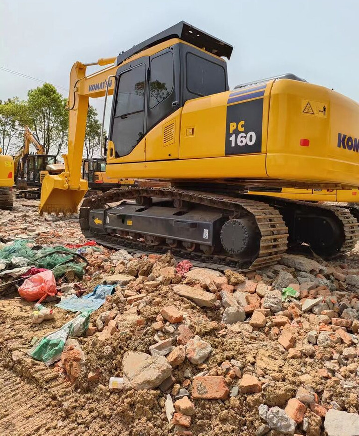 Komatsu PC160 - Kāpurķēžu ekskavators: foto 1 Komatsu PC160 - Kāpurķēžu ekskavators: foto 1
