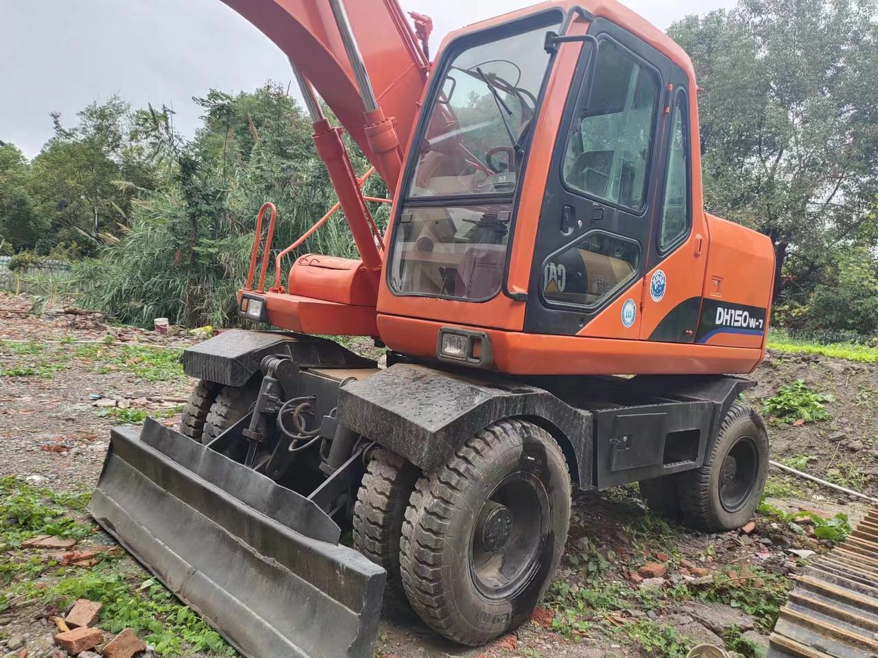 DOOSAN DH150W-7 - Riteņu ekskavators: foto 3 DOOSAN DH150W-7 - Riteņu ekskavators: foto 3