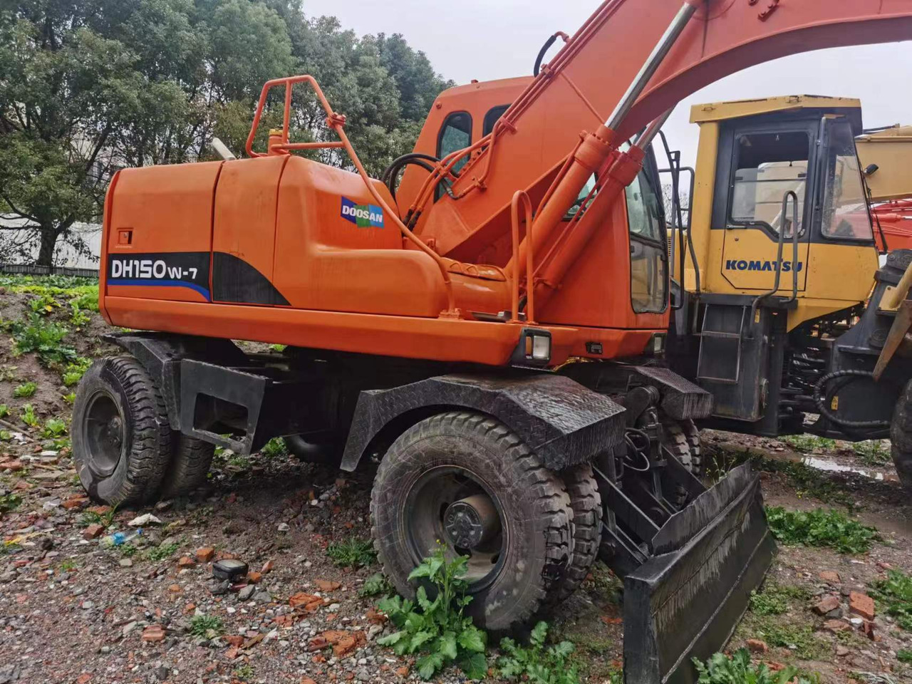 DOOSAN DH150W-7 - Riteņu ekskavators: foto 4 DOOSAN DH150W-7 - Riteņu ekskavators: foto 4