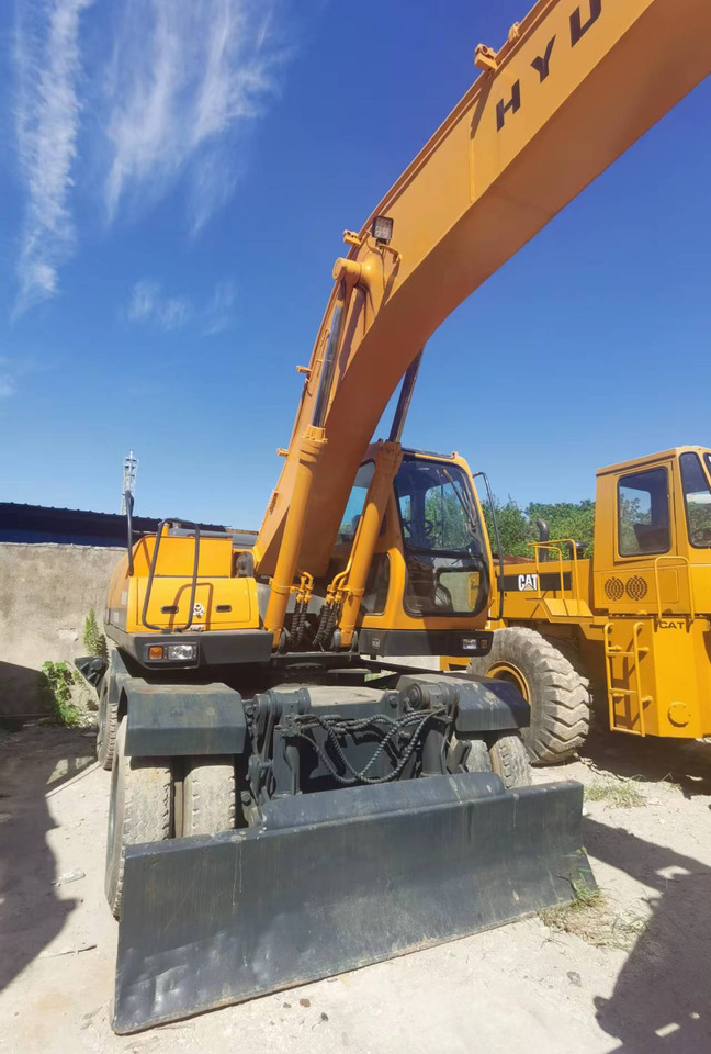 HYUNDAI ROBEX 210W-9 - Riteņu ekskavators: foto 5 HYUNDAI ROBEX 210W-9 - Riteņu ekskavators: foto 5