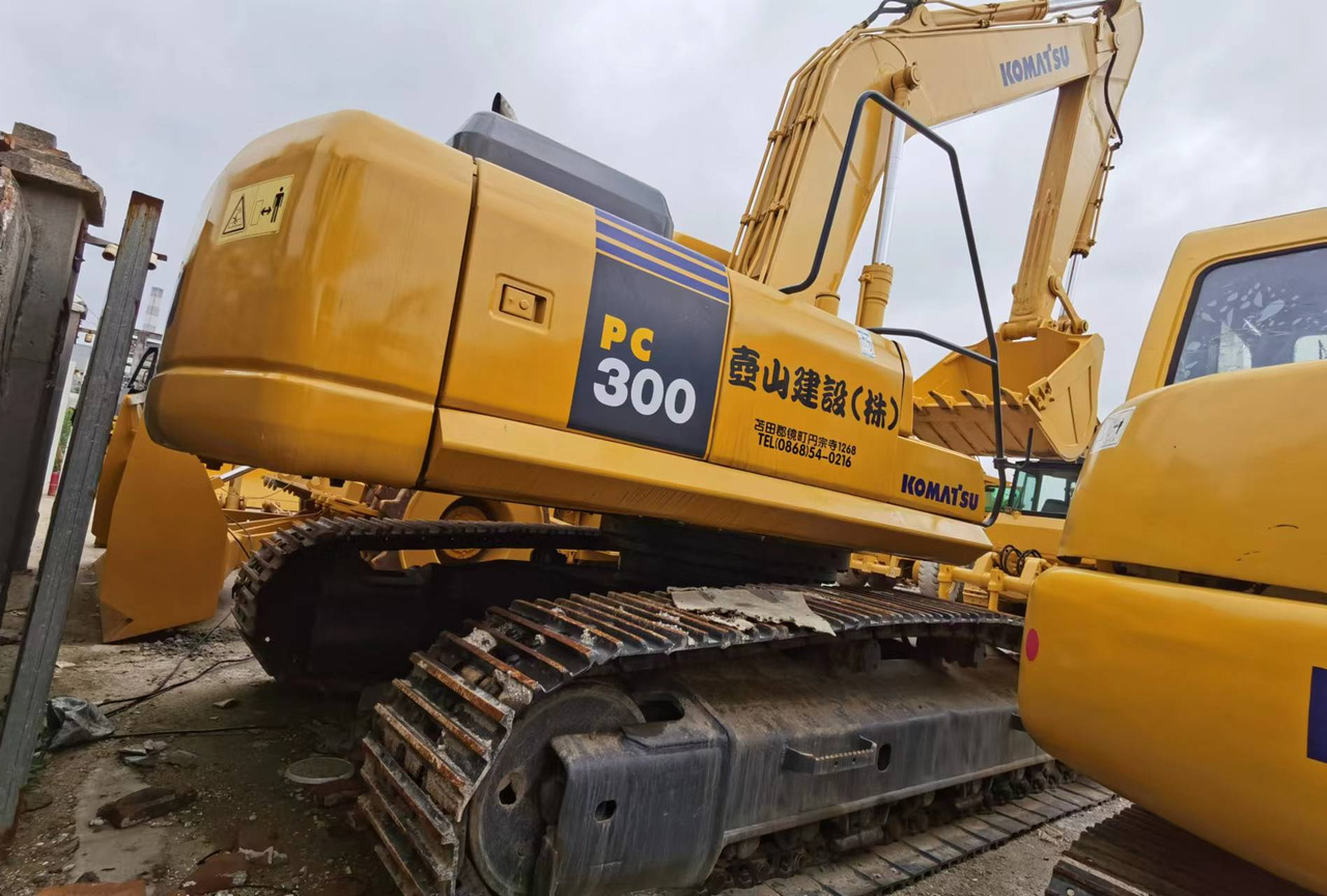 KOMATSU PC300-7 - Kāpurķēžu ekskavators: foto 1 KOMATSU PC300-7 - Kāpurķēžu ekskavators: foto 1