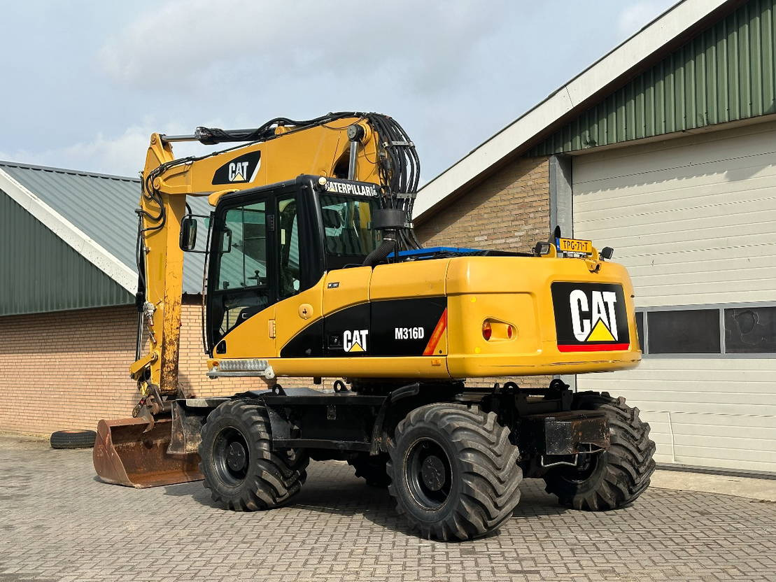 Caterpillar M316D - Riteņu ekskavators: foto 2 Caterpillar M316D - Riteņu ekskavators: foto 2