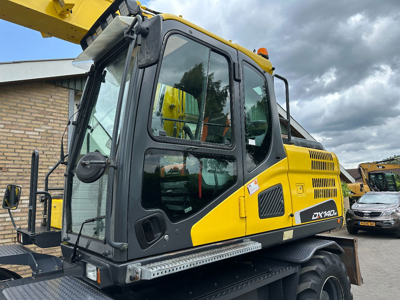 Doosan DX140W-5 - Riteņu ekskavators: foto 3 Doosan DX140W-5 - Riteņu ekskavators: foto 3