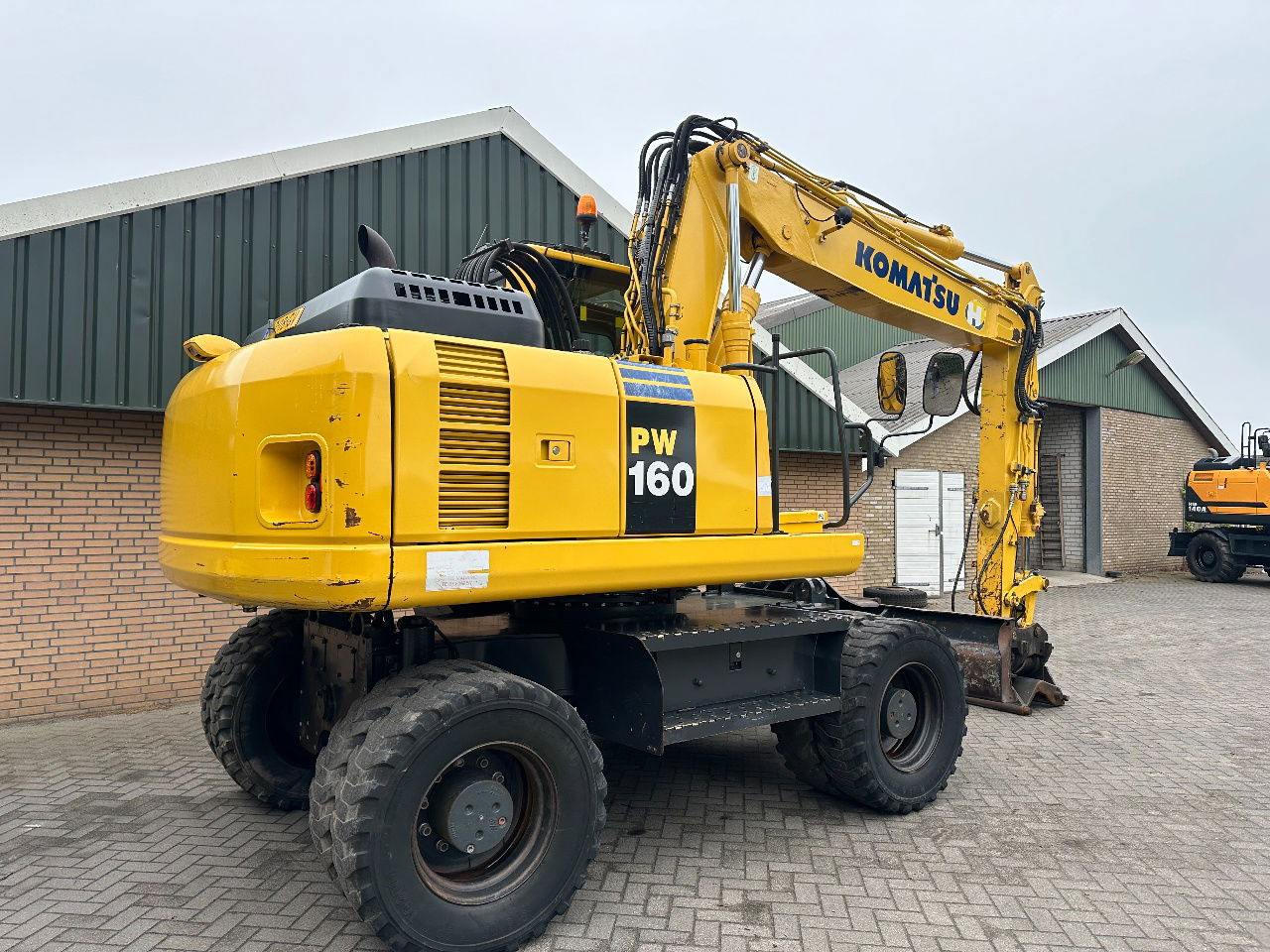 Komatsu PW160-8 - Riteņu ekskavators: foto 5 Komatsu PW160-8 - Riteņu ekskavators: foto 5