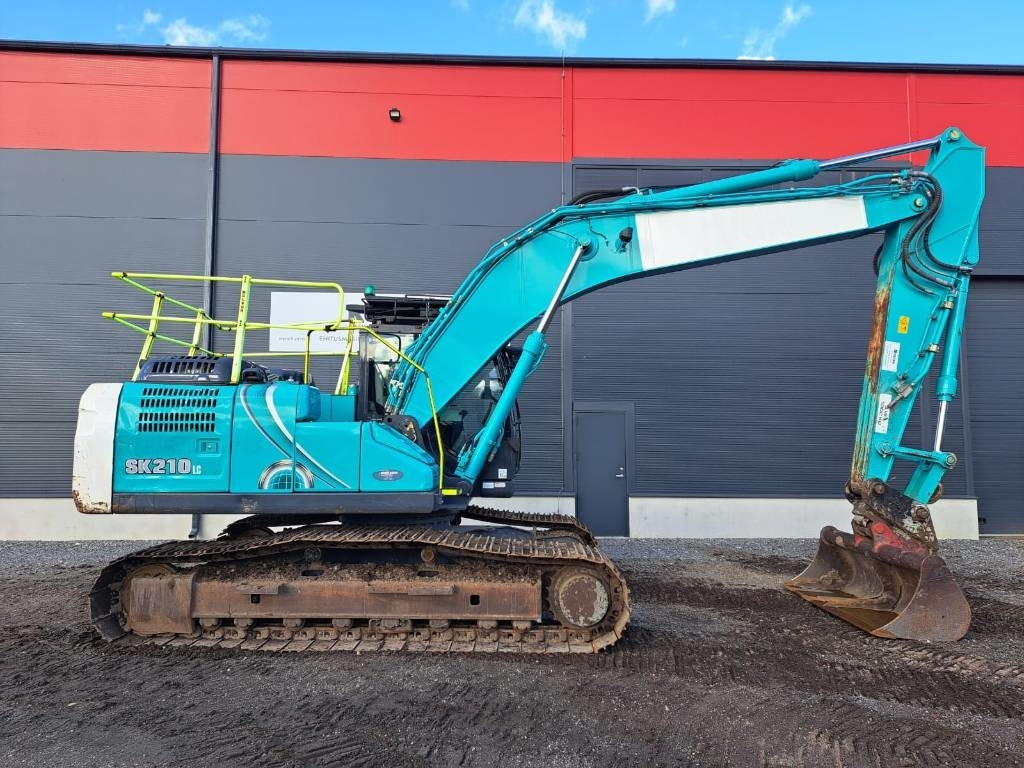 Kobelco SK 210 LC-10E - Kāpurķēžu ekskavators: foto 5 Kobelco SK 210 LC-10E - Kāpurķēžu ekskavators: foto 5