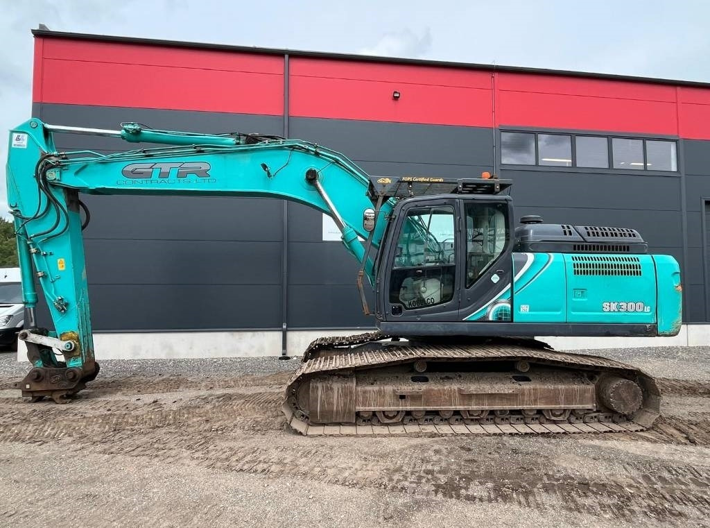 Kobelco SK300LC-10 - Kāpurķēžu ekskavators: foto 2 Kobelco SK300LC-10 - Kāpurķēžu ekskavators: foto 2