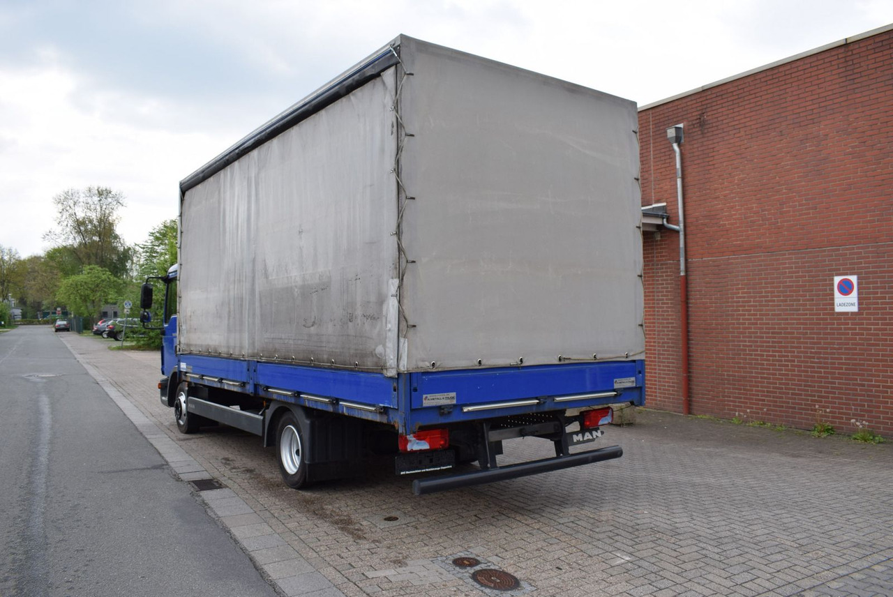 MAN TGL 8.180 Pritsche Schiebeplane Klima 3-Sitzer - Furgons ar tentu: foto 5 MAN TGL 8.180 Pritsche Schiebeplane Klima 3-Sitzer - Furgons ar tentu: foto 5