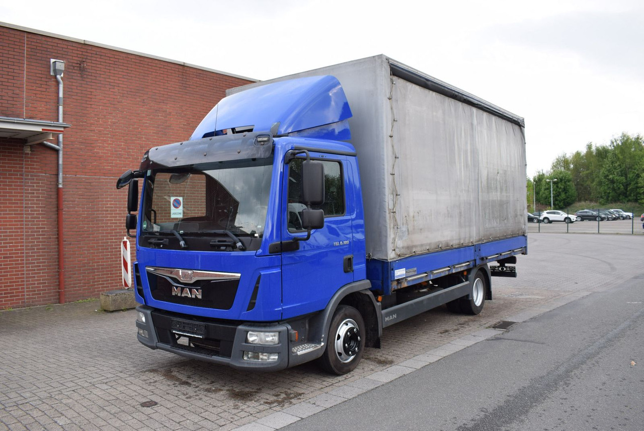 MAN TGL 8.180 Pritsche Schiebeplane Klima 3-Sitzer - Furgons ar tentu: foto 1 MAN TGL 8.180 Pritsche Schiebeplane Klima 3-Sitzer - Furgons ar tentu: foto 1