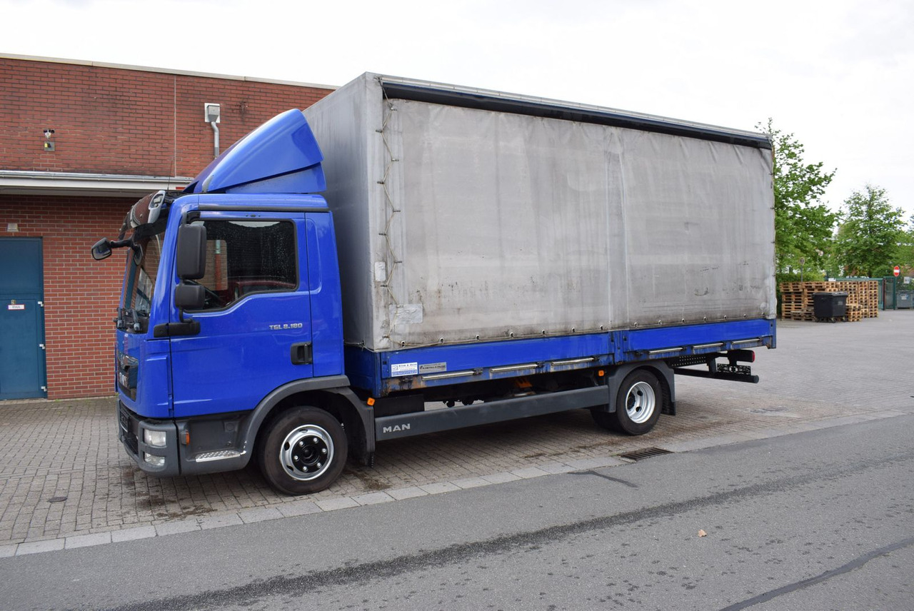 MAN TGL 8.180 Pritsche Schiebeplane Klima 3-Sitzer - Furgons ar tentu: foto 2 MAN TGL 8.180 Pritsche Schiebeplane Klima 3-Sitzer - Furgons ar tentu: foto 2