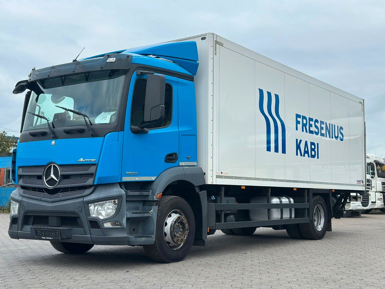 Mercedes-Benz Antos 1830+Isolierkoffer - Kravas automašīna ar slēgto virsbūvi: foto 1 Mercedes-Benz Antos 1830+Isolierkoffer - Kravas automašīna ar slēgto virsbūvi: foto 1
