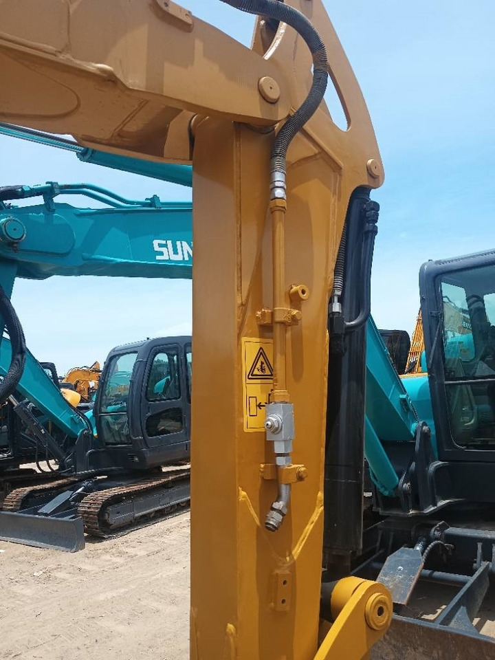 Jaunā Kāpurķēžu ekskavators CAT 304 C: foto 7