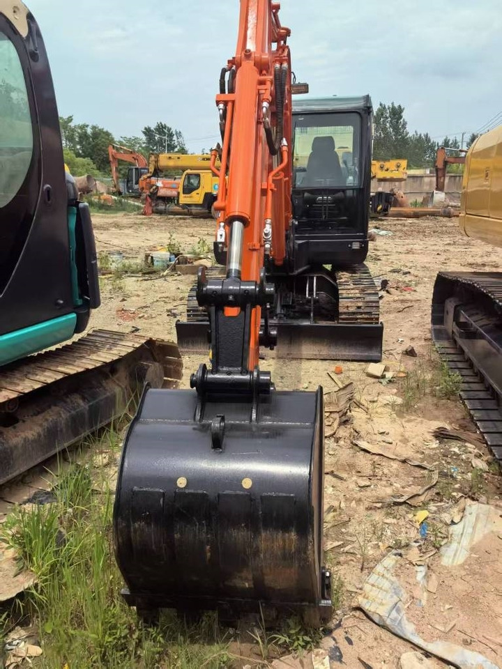 Doosan DX 60 - Kāpurķēžu ekskavators: foto 1 Doosan DX 60 - Kāpurķēžu ekskavators: foto 1