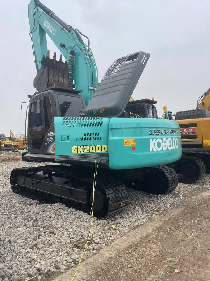 Kobelco SK 200 - Kāpurķēžu ekskavators: foto 1 Kobelco SK 200 - Kāpurķēžu ekskavators: foto 1