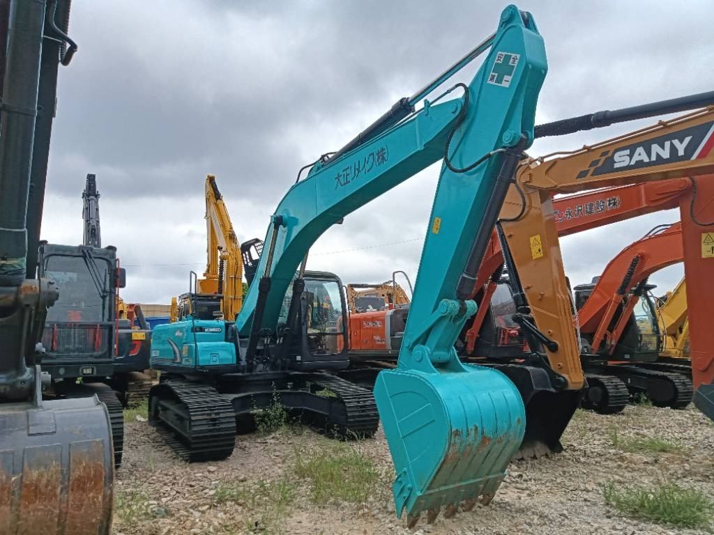 Kobelco SK 210 - Kāpurķēžu ekskavators: foto 2 Kobelco SK 210 - Kāpurķēžu ekskavators: foto 2