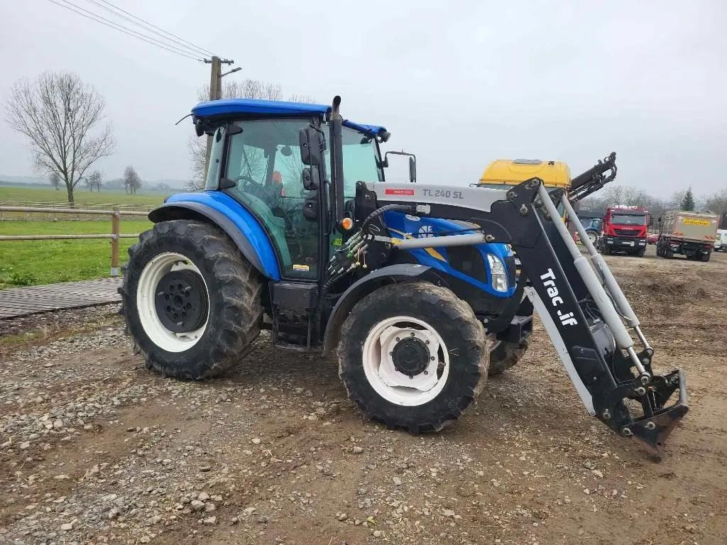 New Holand TD, 5.95, + Trac Lift TL 240 SL - Traktors: foto 2 New Holand TD, 5.95, + Trac Lift TL 240 SL - Traktors: foto 2