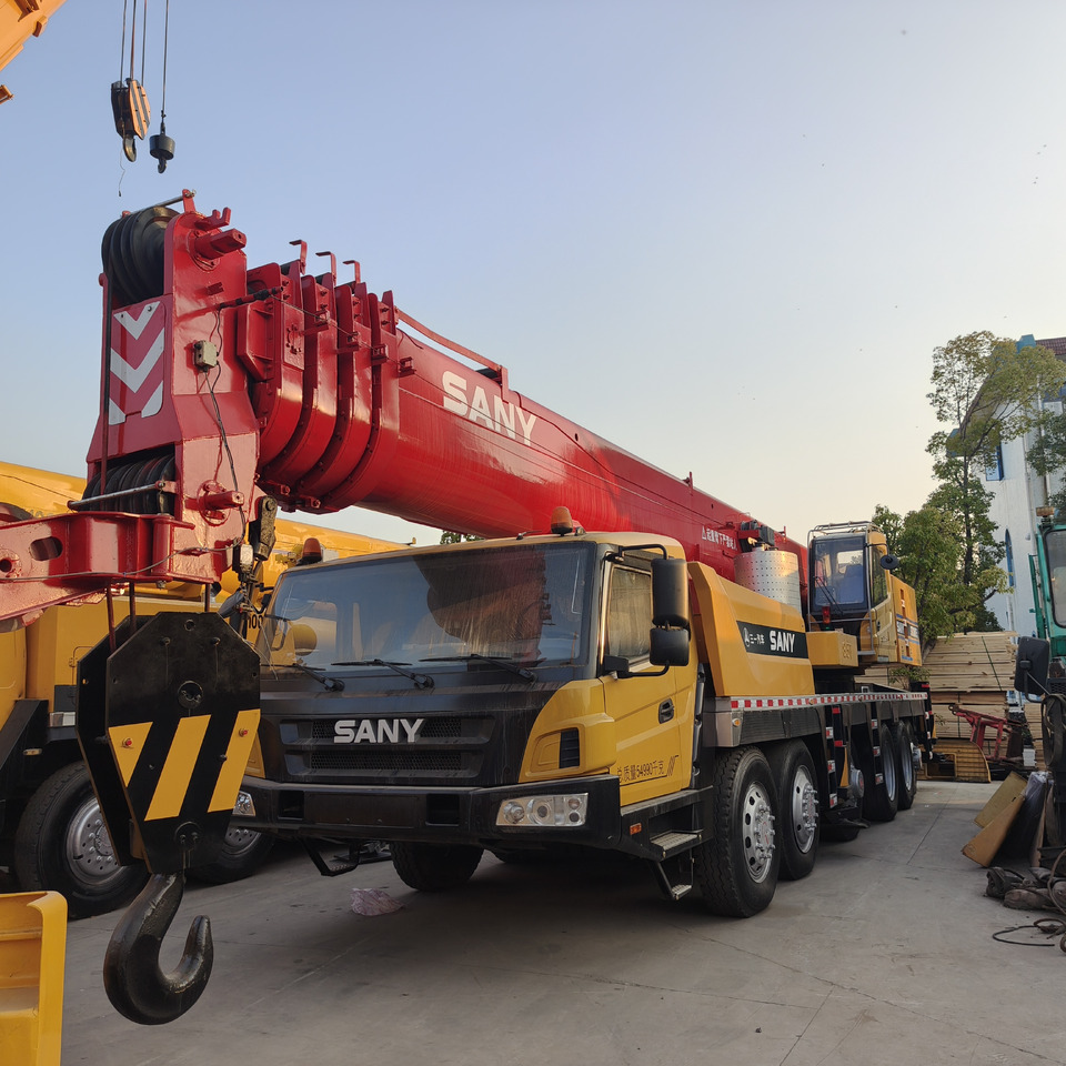 SANY STC1000 100T Truck Crane - Autoceltnis: foto 4 SANY STC1000 100T Truck Crane - Autoceltnis: foto 4