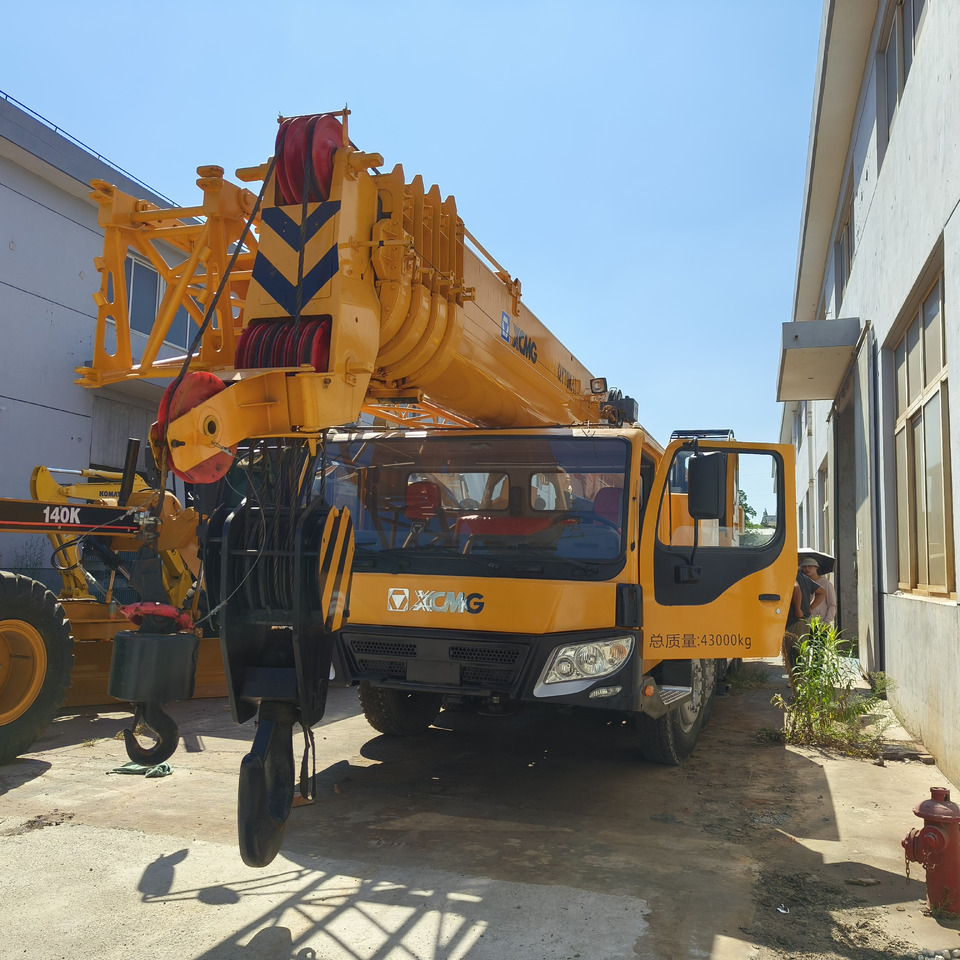 XCMG QY70K Used truck crane - Autoceltnis: foto 4 XCMG QY70K Used truck crane - Autoceltnis: foto 4