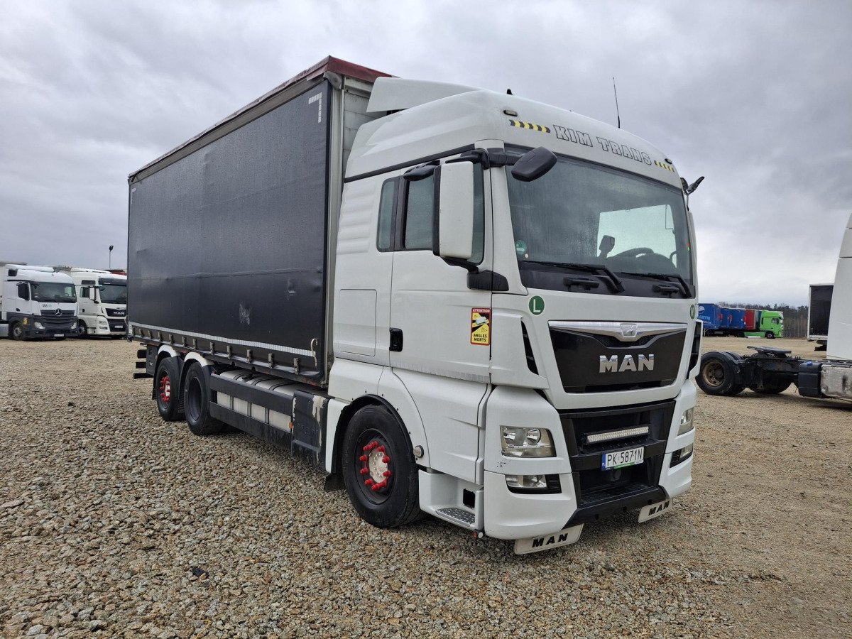 MAN TGX SOLÓWKA - Kravas automašīna ar tentu: foto 1 MAN TGX SOLÓWKA - Kravas automašīna ar tentu: foto 1