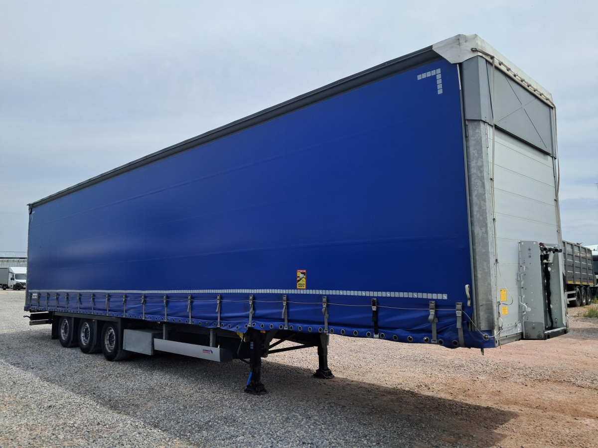 SCHMITZ CARGOBULL SCB S3T FIRANA - Piekabe ar tentu: foto 1 SCHMITZ CARGOBULL SCB S3T FIRANA - Piekabe ar tentu: foto 1