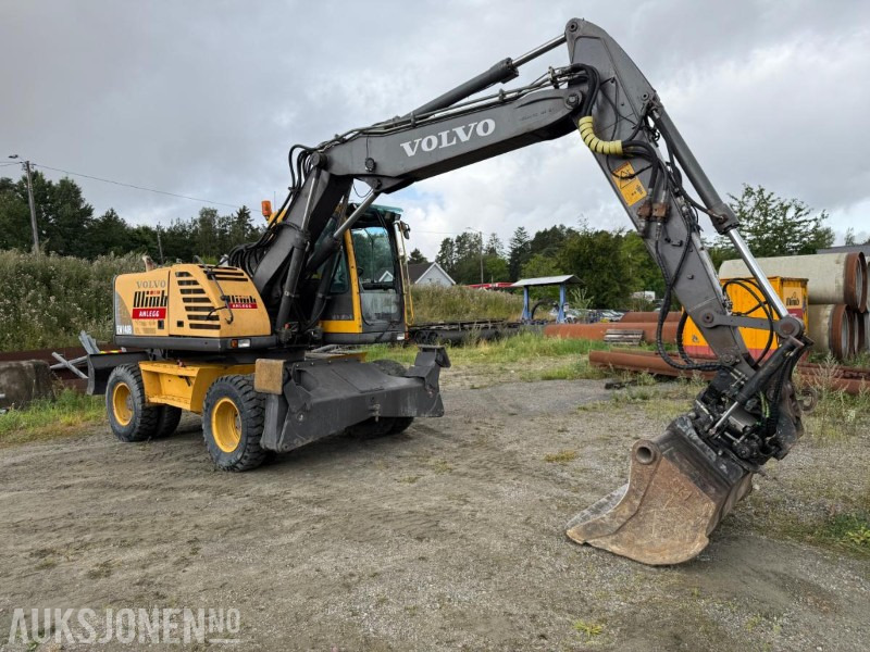 2006 Volvo EW140B Hjulgraver m/pallegaffel og skuff - Steelwrist tiltrotator. - Ekskavators: foto 2 2006 Volvo EW140B Hjulgraver m/pallegaffel og skuff - Steelwrist tiltrotator. - Ekskavators: foto 2
