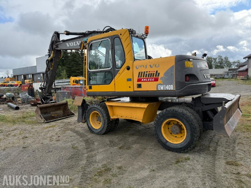 2006 Volvo EW140B Hjulgraver m/pallegaffel og skuff - Steelwrist tiltrotator. - Ekskavators: foto 5 2006 Volvo EW140B Hjulgraver m/pallegaffel og skuff - Steelwrist tiltrotator. - Ekskavators: foto 5