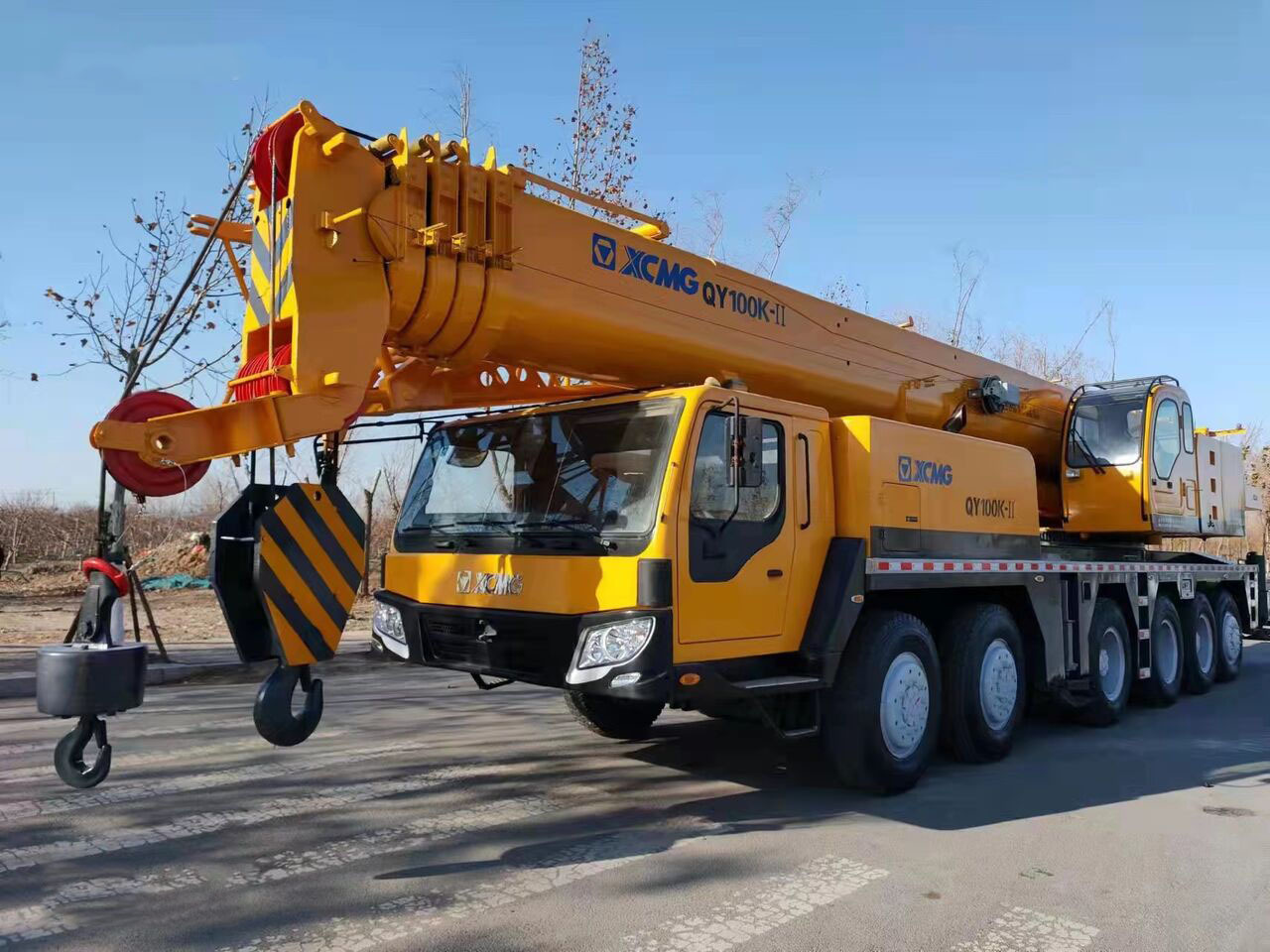 XCMG 100 Ton used truck crane QY100 with 68 meter telescopic boom on sale - Autoceltnis: foto 1 XCMG 100 Ton used truck crane QY100 with 68 meter telescopic boom on sale - Autoceltnis: foto 1