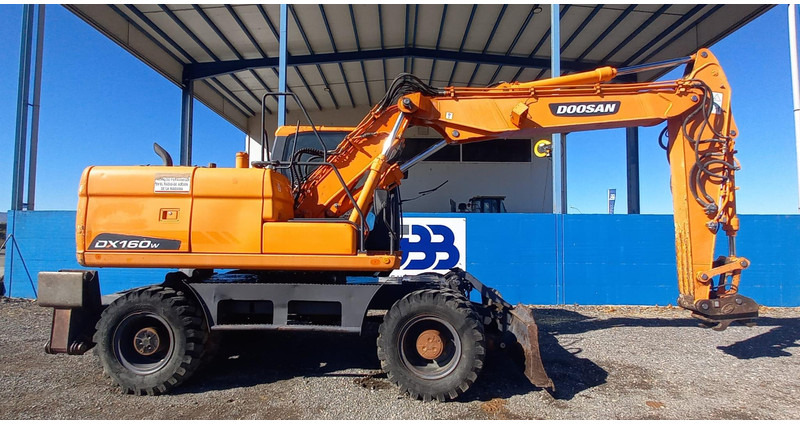 Doosan DX140W-3 - Riteņu ekskavators: foto 2 Doosan DX140W-3 - Riteņu ekskavators: foto 2