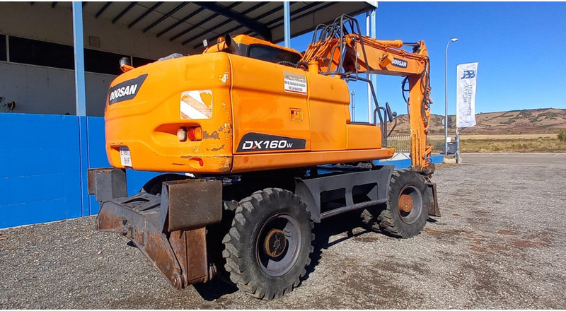 Doosan DX140W-3 - Riteņu ekskavators: foto 4 Doosan DX140W-3 - Riteņu ekskavators: foto 4