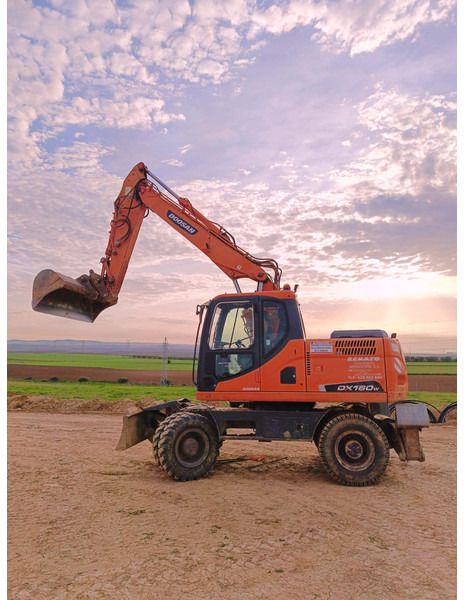 Doosan DX140W-3 *coming soon* - Riteņu ekskavators: foto 2 Doosan DX140W-3 *coming soon* - Riteņu ekskavators: foto 2