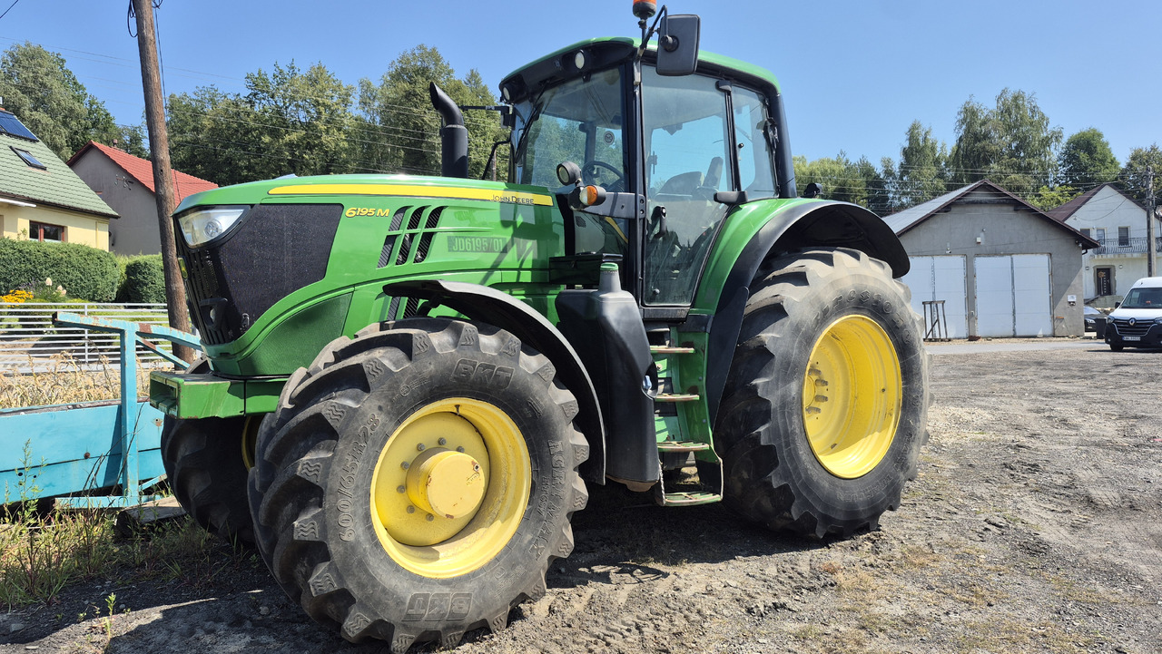 JOHN DEERE 6195M - Traktors: foto 2 JOHN DEERE 6195M - Traktors: foto 2