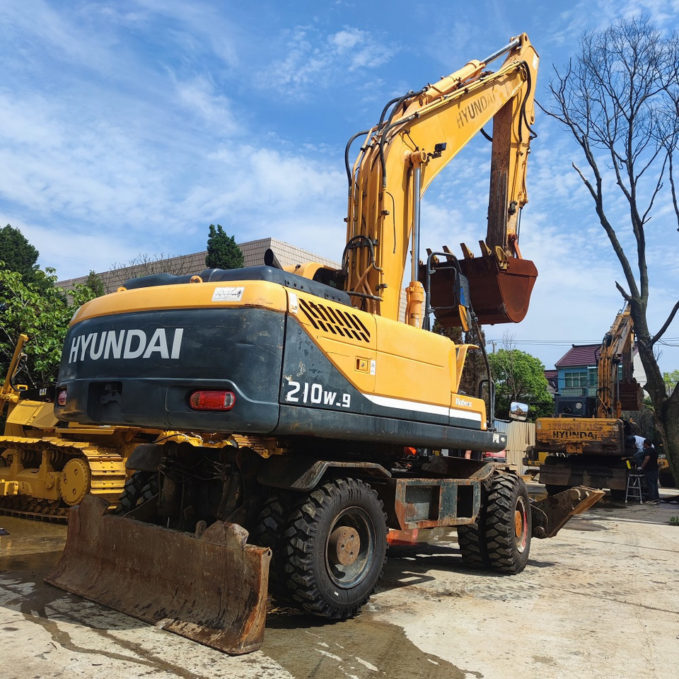 Hyundai 210w-9 wheel excavator - Riteņu ekskavators: foto 5 Hyundai 210w-9 wheel excavator - Riteņu ekskavators: foto 5