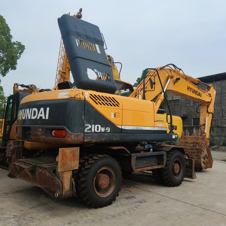 Hyundai 210w-9 wheel excavator - Riteņu ekskavators: foto 4 Hyundai 210w-9 wheel excavator - Riteņu ekskavators: foto 4