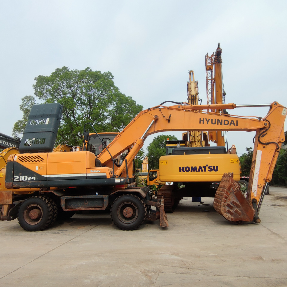 Hyundai 210w-9 wheel excavator - Riteņu ekskavators: foto 1 Hyundai 210w-9 wheel excavator - Riteņu ekskavators: foto 1
