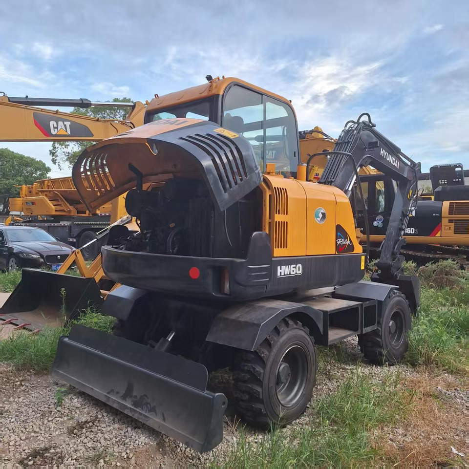 Hyundai HW60  excavator - Riteņu ekskavators: foto 4 Hyundai HW60  excavator - Riteņu ekskavators: foto 4