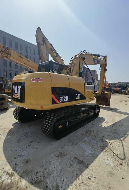 Used CAT 312D2 hydraulic Crawler excavator CATERPILLAR CAT312 second hand hydraulic machinery digger CAT312D on stock - Kāpurķēžu ekskavators: foto 4 Used CAT 312D2 hydraulic Crawler excavator CATERPILLAR CAT312 second hand hydraulic machinery digger CAT312D on stock - Kāpurķēžu ekskavators: foto 4