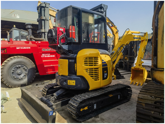 Used Komatsu PC70-8 mini digger original Japan Komatsu PC70 PC78 PC60 PC35mr PC40mr PC55mr small excavator on sale - Kāpurķēžu ekskavators: foto 1 Used Komatsu PC70-8 mini digger original Japan Komatsu PC70 PC78 PC60 PC35mr PC40mr PC55mr small excavator on sale - Kāpurķēžu ekskavators: foto 1