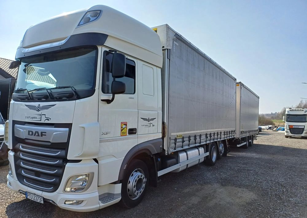 DAF XF 480 SUPER SPACE CAB / ZESTAW TANDEM PRZEJAZDOWY 120m3 - Kravas automašīna ar tentu: foto 1 DAF XF 480 SUPER SPACE CAB / ZESTAW TANDEM PRZEJAZDOWY 120m3 - Kravas automašīna ar tentu: foto 1