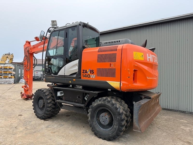 Hitachi ZX 140 W-5 - Riteņu ekskavators: foto 2 Hitachi ZX 140 W-5 - Riteņu ekskavators: foto 2