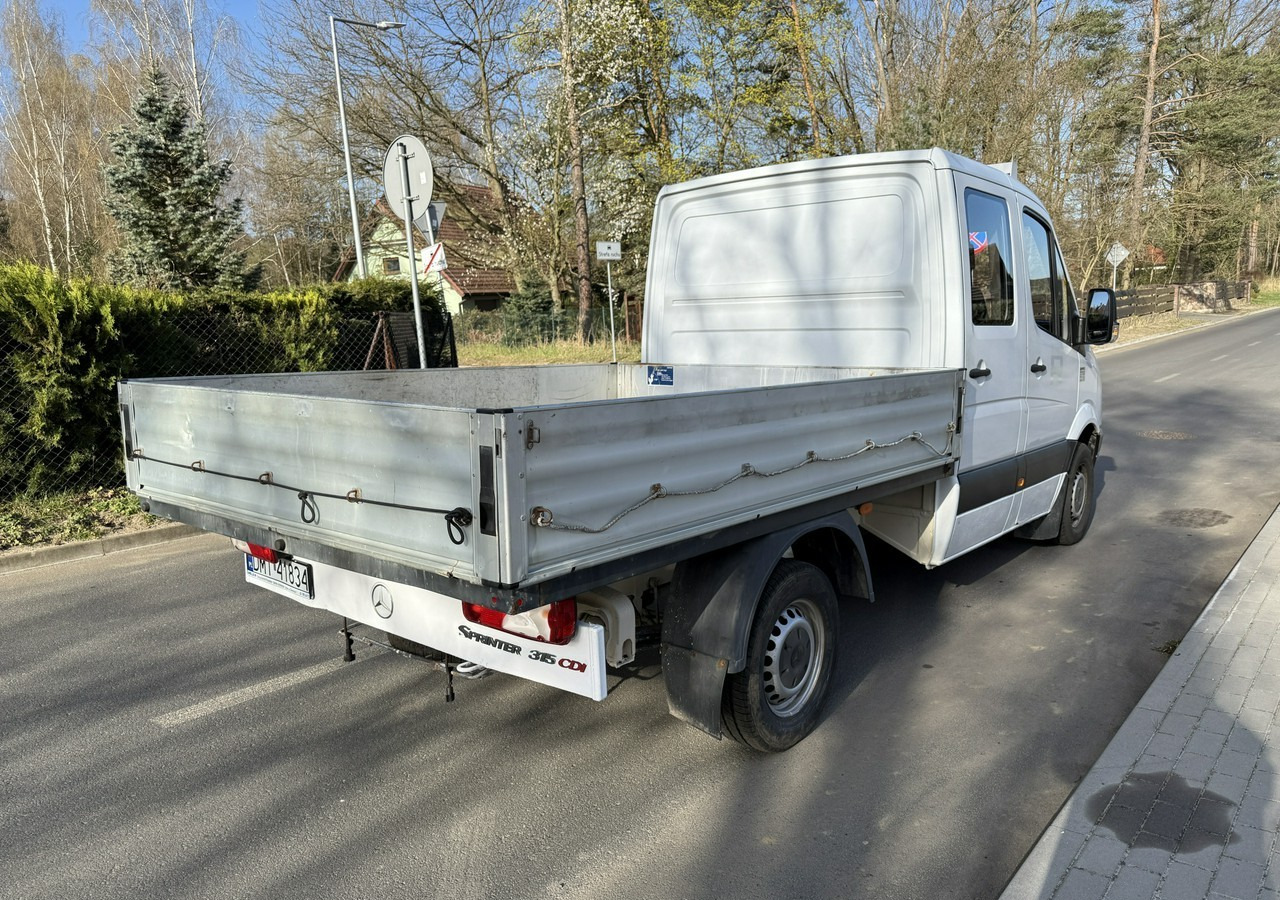 Mercedes-Benz Sprinter Sprinter 315 CDI dokka doka Brygadówka skrzynia 2007 - Automašīna ar kravas platformu, Kravas-pasažieru furgons: foto 3 Mercedes-Benz Sprinter Sprinter 315 CDI dokka doka Brygadówka skrzynia 2007 - Automašīna ar kravas platformu, Kravas-pasažieru furgons: foto 3